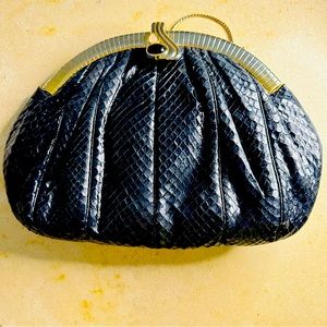 Judith Leiber vintage handbag with black onyx-Opal semiprecious stones in clasp.